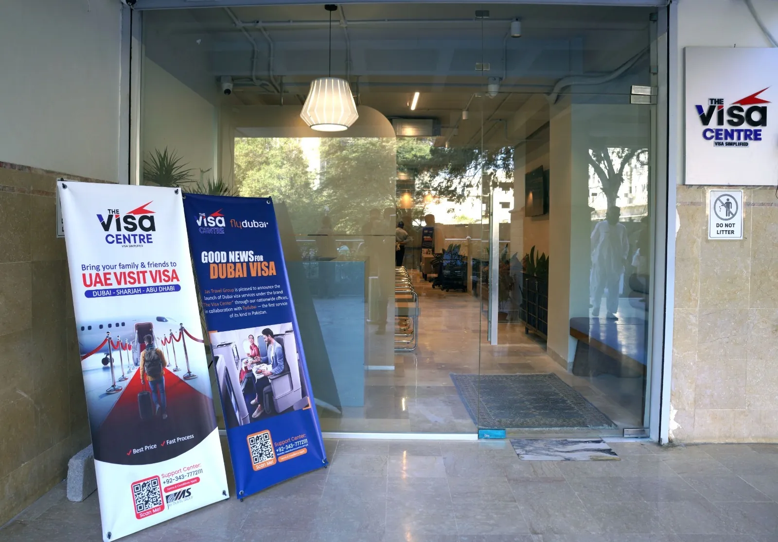The Visa Centre entrance with TVC and flydubai UAE visa banners