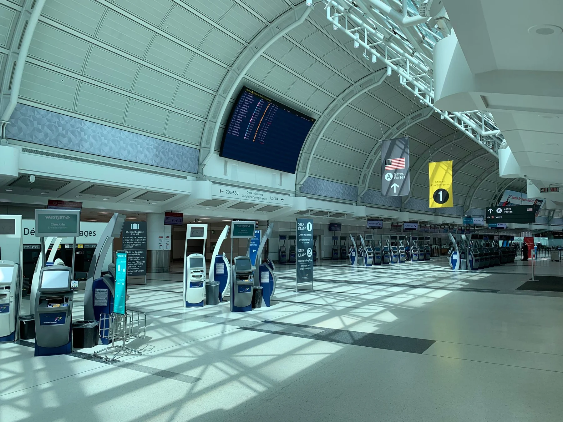 Creative design interior of contemporary airport with corridor under information board and signboards